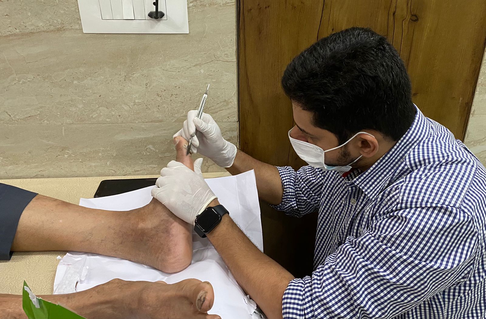 Diabetic foot care being performed